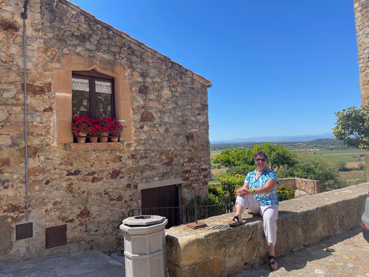 Traveler enjoying scenic view on European stone terrace